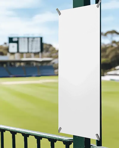 Outdoor Stadium Banner Mockup Vertical Banner Attached To Green Pole With Blurred Field And Scoreboard View