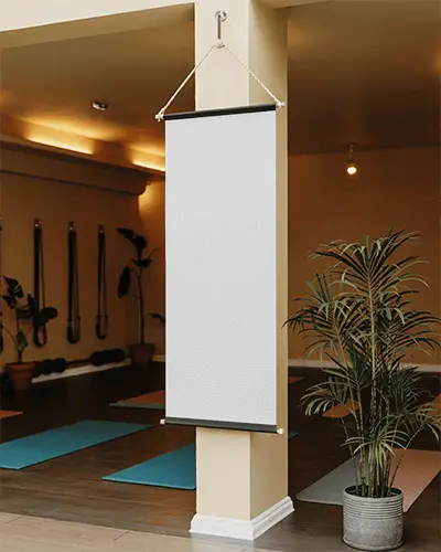 Indoor Yoga Studio Billboard Mockup Hanging Scroll Banner On Pillar With Mats And Soft Lighting