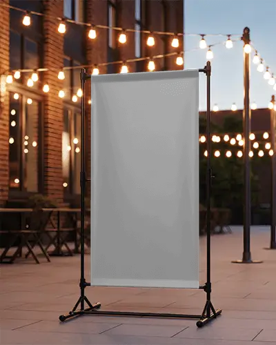 Outdoor Evening Banner Mockup With String Lights And Brick Building In Cozy Urban Courtyard