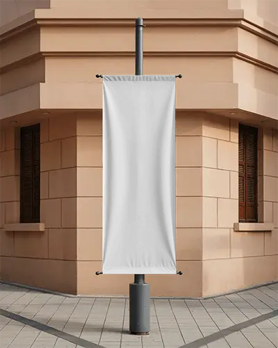 City Street Banner Mockup Mounted On Pole With Peach Building Backdrop And Tiled Walkway
