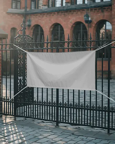 iron-gate-banner-mockup-in-historic-brick-building-setting-soft-light-and-wet-pavement