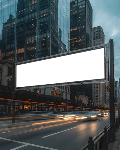 large-empty-banner-on-city-traffic-street-high-rise-buildings-nighttime-roadway-scene