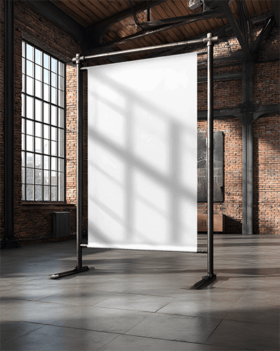 large-vertical-fabric-banner-poster-mockup-on-metal-stand-in-industrial-style-room-setting