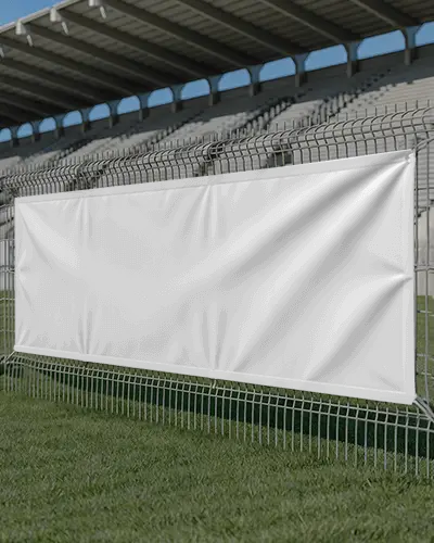 Sports Stadium Banner Mockup On Metal Fence With Green Grass Field And Empty Seating Stands In View