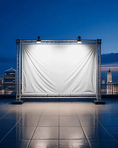 Large Blank Outdoor Banner Mockup On Urban Rooftop Nighttime With Bright Spotlights