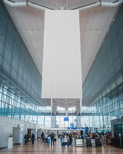 Airport Hall Banner Mockup Large Vertical Hanging Display In Modern Terminal With Travelers And Glass Architecture Bright Daylight Scene