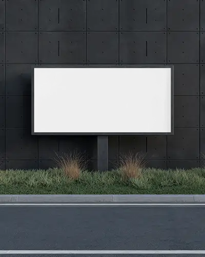 dark-modern-wall-horizontal-billboard-mockup-minimal-black-panel-with-grass-and-urban-curb-line