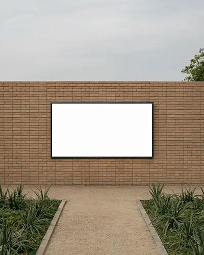 garden-brick-wall-horizontal-billboard-mockup-symmetrical-garden-under-cloudy-sky