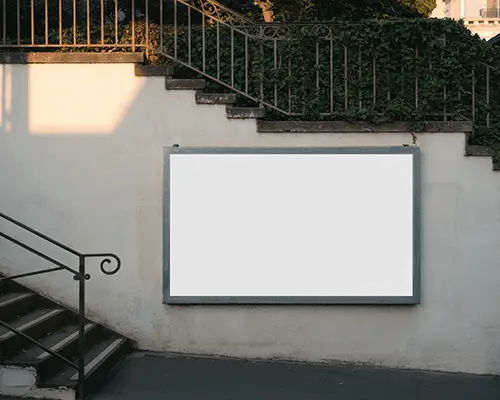 elegant-staircase-horizontal-billboard-mockup-evening-light-on-white-wall-with-iron-railing