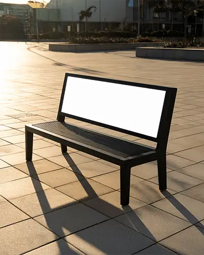 modern-bench-billboard-mockup-in-open-plaza-under-soft-golden-hour-sunlight