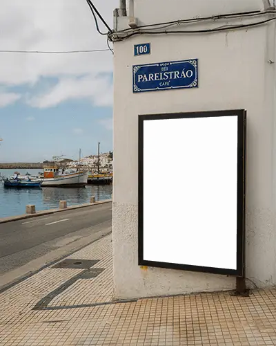 coastal-street-billboard-mockup-on-white-wall-overlooking-harbor-and-docked-boats