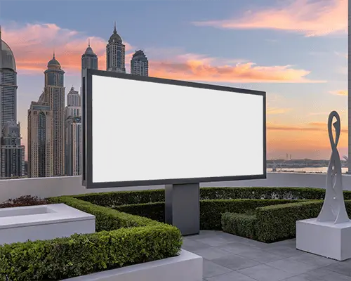 large-outdoor-billboard-mockup-on-rooftop-surrounded-by-greenery-and-cityscape-view