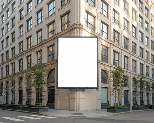 Large Billboard Mockup Mounted On City Building At Busy Intersection For Promotion