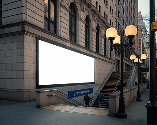 City Street Billboard Mockup On Stone Building Wall Above Subway Entrance