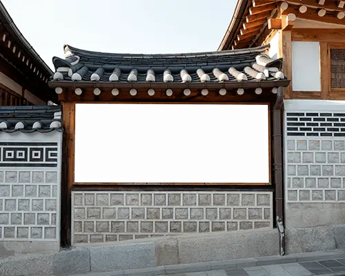 Traditional Billboard Mockup On Korean Hanok Wall With Wooden Frame In Cultural Street Setting