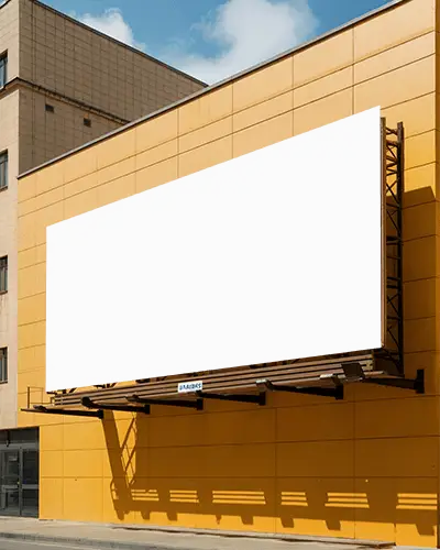 Large Empty Urban Billboard Mockup Mounted On Commercial Building Exterior For Advertising