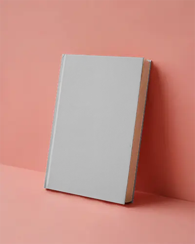 A4 Book Mockup Standing Angle Grey Hardcover On Coral Background Soft Shadows Clean Layout Modern Publication Style
