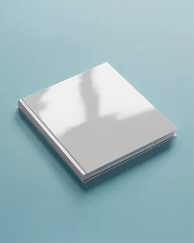 Book Mockup Glossy Cover On Light Blue Surface With Soft Reflections Modern And Clean Editorial Style Realistic Lighting