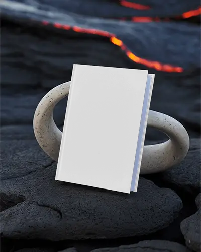 Front View A4 Book Mockup Balanced On Stone Loop Sculpture Over Dark Volcanic Rocks With Glowing Lava Background