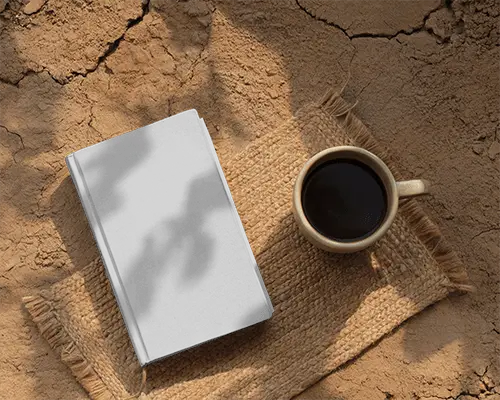 Outdoor Moment Book Mockup On Woven Mat Over Earthy Surface Cozy Scene With Subtle Shadow Texture
