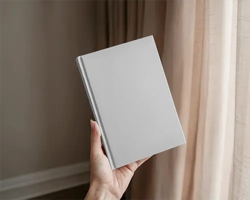 Neutral Curtain Background Hand Holding Hardcover Book Mockup With Soft Natural Light Home Interior