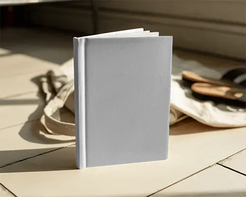 Upright Book Mockup On Wooden Floor Daylight Angled Book With Open Pages And Relaxed Room Ambience