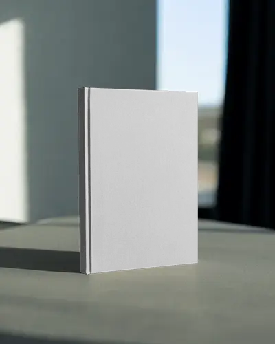 Minimal Book Mockup On Round Table With Soft Daylight And Blurred Window Background