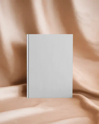 Sleek Minimalist Hardcover Book Mockup On Soft Fabric Backdrop Perfect Presentation