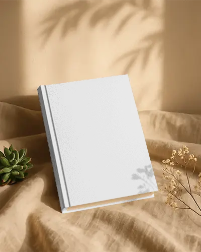 hardcover-book-mockup-on-natural-fabric-background-with-soft-shadow-plant-elements-display