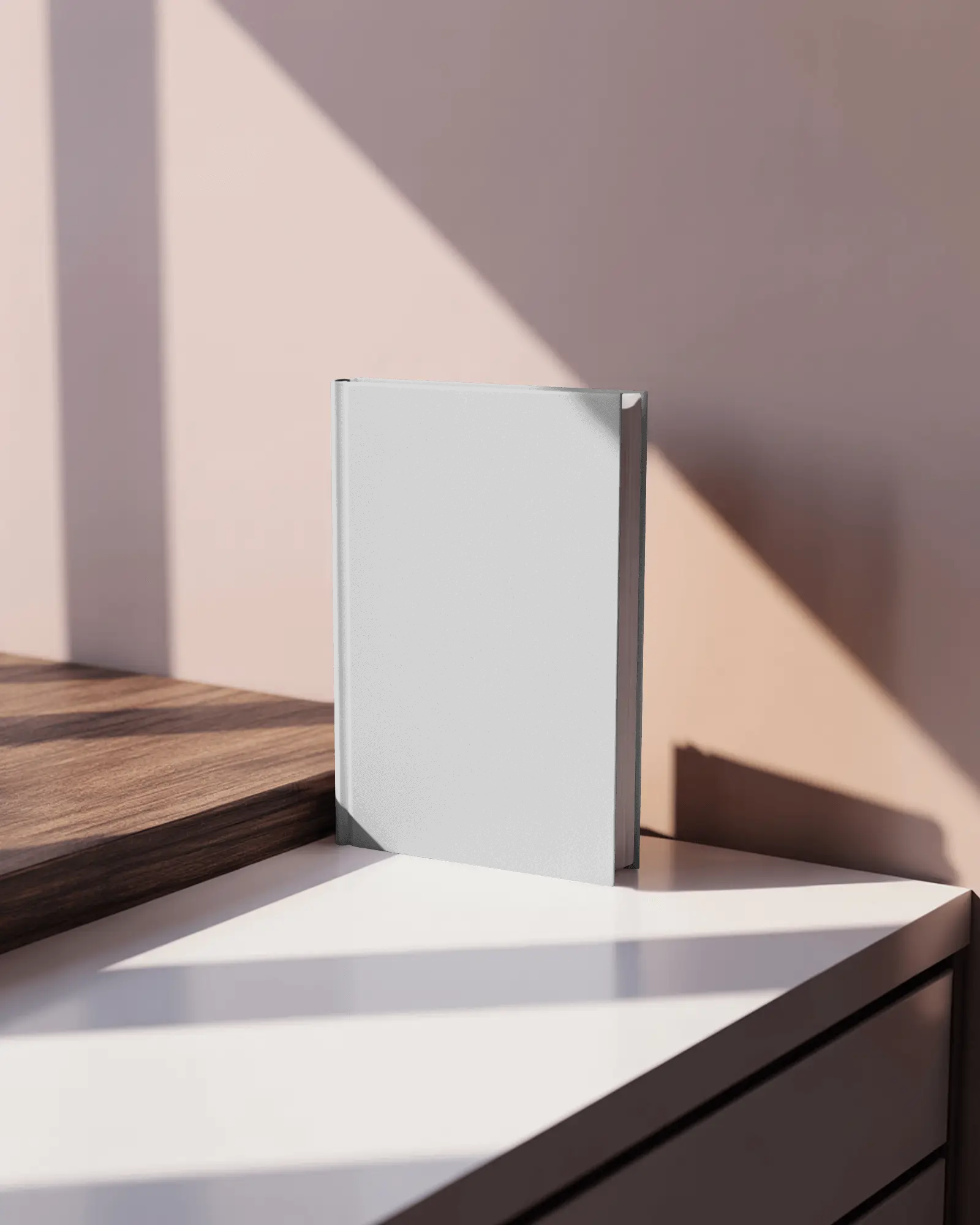 sleek-stylish-book-mockup-on-white-table-next-to-wooden-edge-and-soft-light-shadow