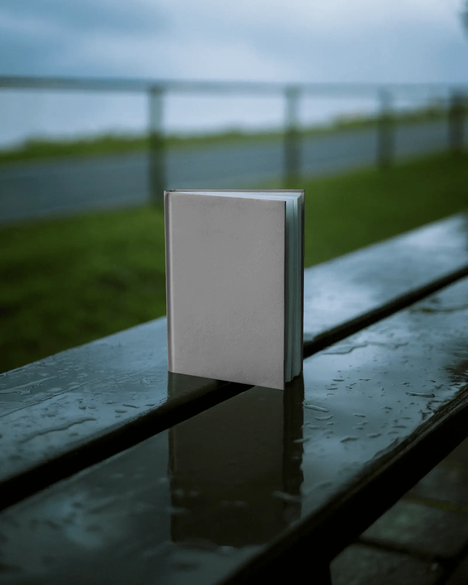 blank-open-pages-hardback-book-mockup-on-reflective-wooden-bench-under-cloudy-skies