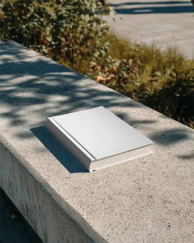 Hardcover Book Mockup On Concrete Bench Outdoor Nature Background High Quality