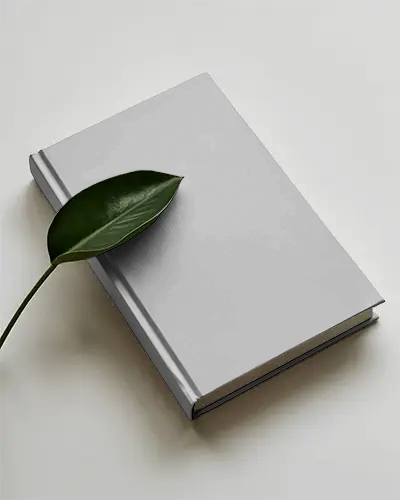 elegant-closed-book-mockup-with-clean-design-and-natural-leaf-accent