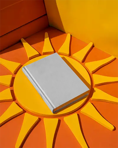 Hardcover Book Mockup On Geometric Sun Pattern Backdrop Perfect For Promotions