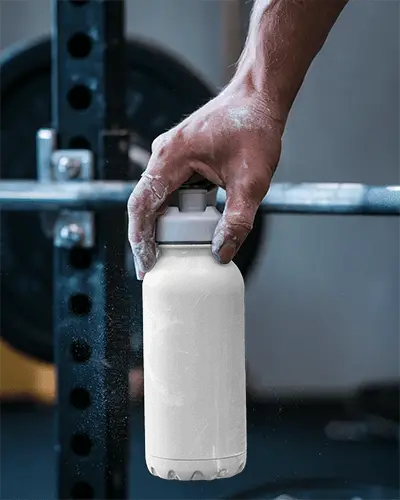 Small Plastic Water Bottle Mockup Handheld Gym Scene Textured Grip Cap Functional Athletic Style