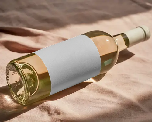 elegant-glass-wine-bottle-mockup-laying-on-textured-fabric-background-for-branding