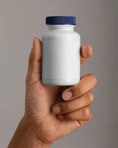 Realistic Compact Plastic Bottle Mockup Held In Hand For Supplement Packaging