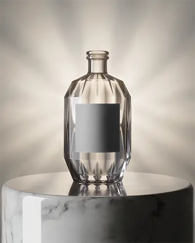 Crystal Clear Glass Bottle Mockup With Faceted Surfaces And Black Label On Marble Pedestal