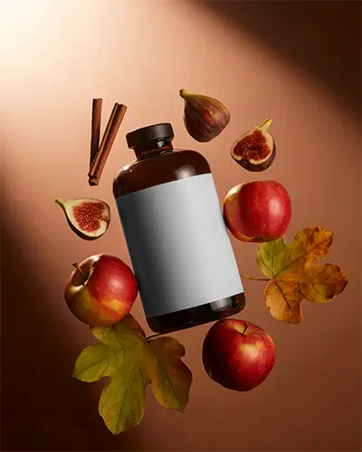 Natural Fruit Infused Bottle Mockup With Apple Fig Cinnamon And Autumn Leaves Background
