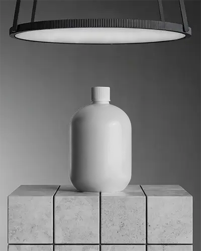 Sleek Bottle Mockup On Stone Blocks With Modern Studio Lighting Ideal For Product Display