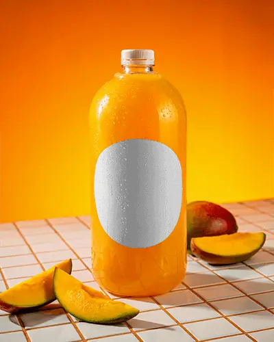 Chilled Fruit Juice Plastic Bottle Mockup With Mango Slices On Tiled Table