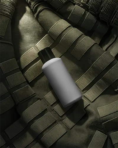 Sleek Matte Finish Bottle Mockup On Tactical Gear Background For Military Product Packaging