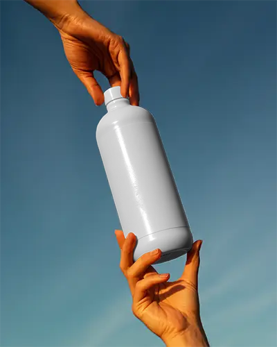 Realistic Empty Bottle Mockup In Hand With Smooth Surface For Custom Design Display