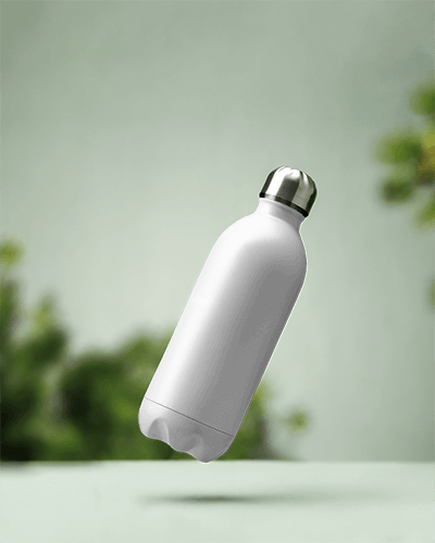 Metallic Water Bottle Mockup Tilted In Natural Green Background Outdoor Inspired Design