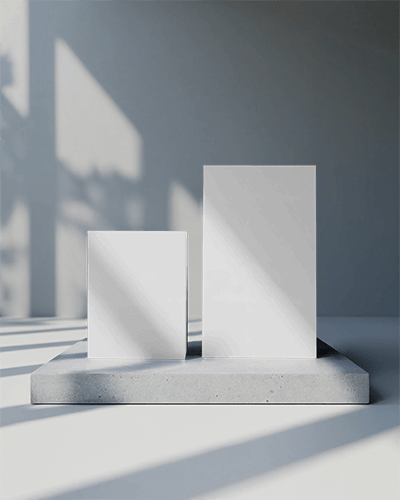 Dual Box Mockup On Concrete Platform With Hard Shadows In Modern Sunlit Studio Environment