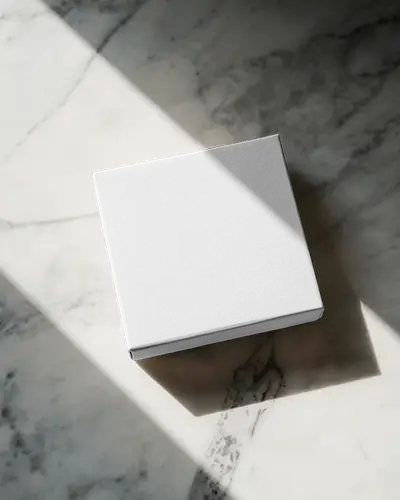 Square Rigid Box Mockup On Marble Surface Harsh Diagonal Lighting Luxury Unboxing Mood