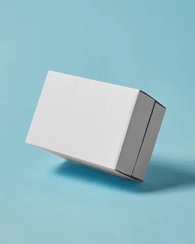 Tilted Cardboard Box Mockup On Blue Floor Modern Mailer Packaging Display