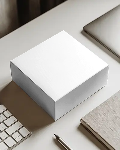 Square Box Mockup On Work Desk With Laptop Keyboard And Notebook Suitable For Office Branding
