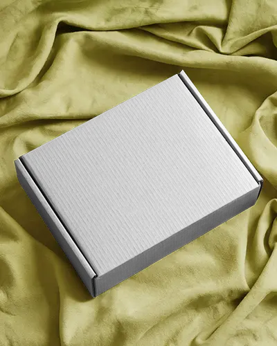 premium-mailer-box-mockup-flat-lay-on-olive-cloth-surface-stylish-luxury-packaging