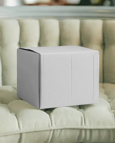 Cube Packaging Box Mockup On Soft Padded Sofa Modern Interior Lighting